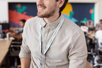 Lanyard Mockup Featuring a Young Man at Work