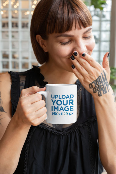 Mockup of a Tattooed Woman Holding an 11 Oz Coffee Mug