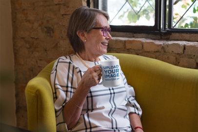 15 Oz Mug Mockup of a Smiling Grandma Sitting on a Couch 27449