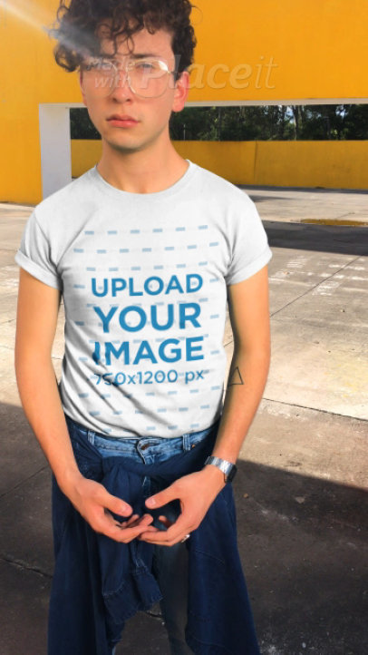 T-Shirt Video of a Man With Curly Hair and Vintage Glasses 