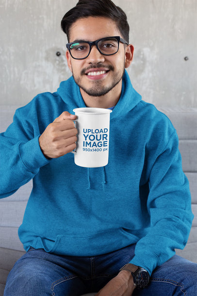 21 Oz Enamel Mug Mockup of a Man with Glasses Sitting against a Concrete Wall 26940
