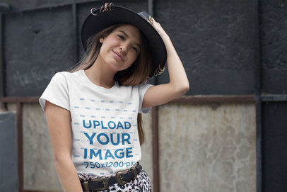 T-Shirt Mockup of a Woman Wearing a Fedora Hat