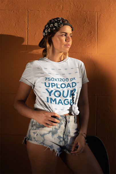 Mockup of a Hip Woman Wearing a Knotted T-Shirt