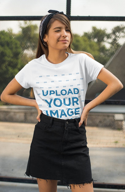 T-Shirt Mockup of a Woman with a Headband Winking at the Camera
