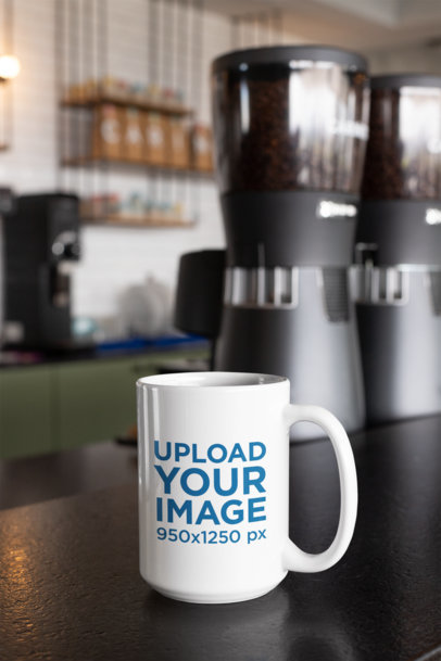 Mockup of a 15 Oz Coffee Mug against Coffee Grinders at a Cafe 