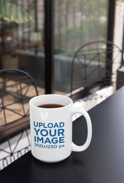 15 Oz Coffee Mug Mockup over a Modern Patio Table