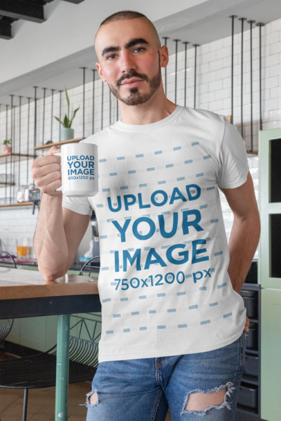 Mockup of a Man with a Buzzcut Wearing a T-Shirt while Holding a 15 Oz Mug 27524