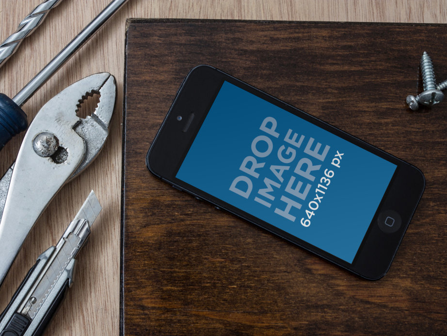 Mockup of an iPhone Placed by Some Tools