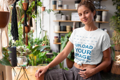 Mockup of a Hippie Woman Posing with a Knotted T-Shirt