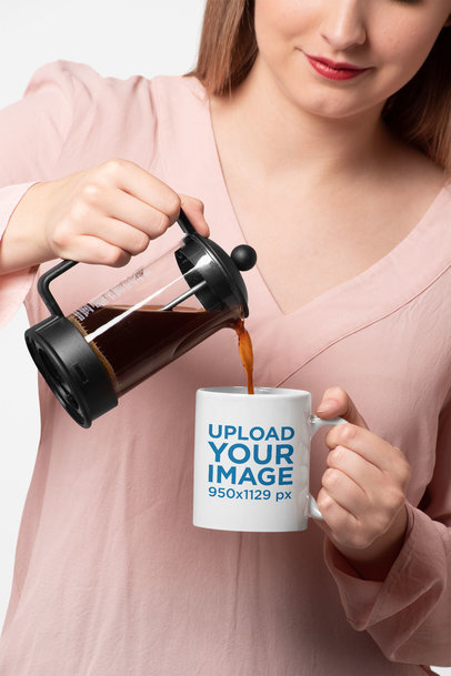 Mockup of a Woman Pouring Hot Coffee into an 11 Oz Mug