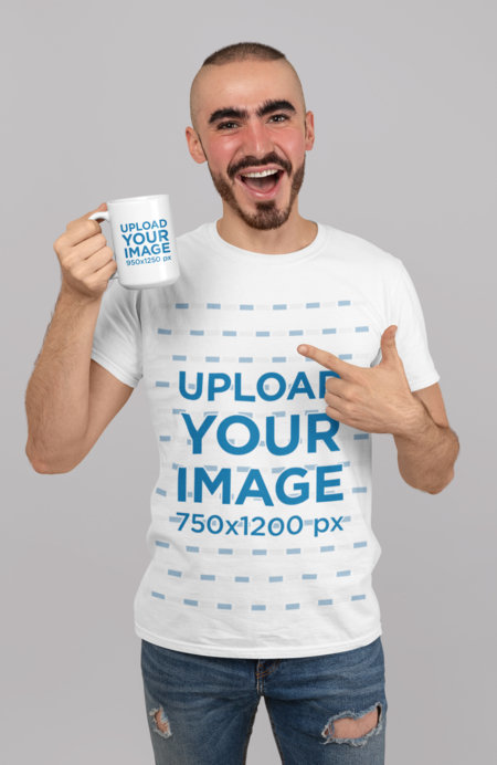 Mockup of a Happy Man Wearing a T-Shirt and Showing a 15 oz Coffee Mug