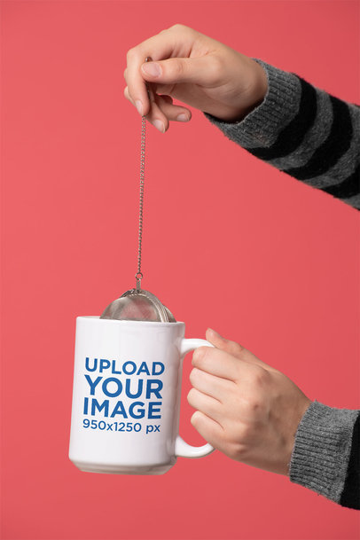 Mockup of a 15 Oz Mug with a Tea Infuser over a Solid Background
