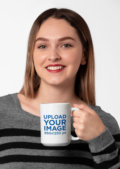 15 Oz Mug Mockup of a Young Woman Drinking Coffee in Front of a Solid Backdrop