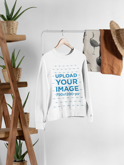Mockup of a Hanged Sweatshirt Featuring a Hipster-Looking Setting