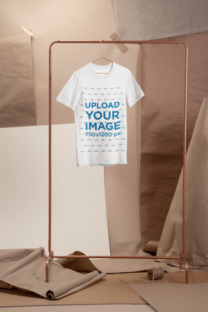Crewneck T-Shirt Mockup Hanged on a Simple Copper Rack