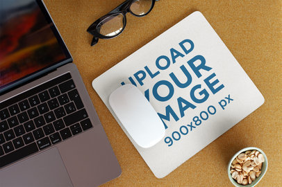 Mockup of a Mousepad Lying on a Work Desk 