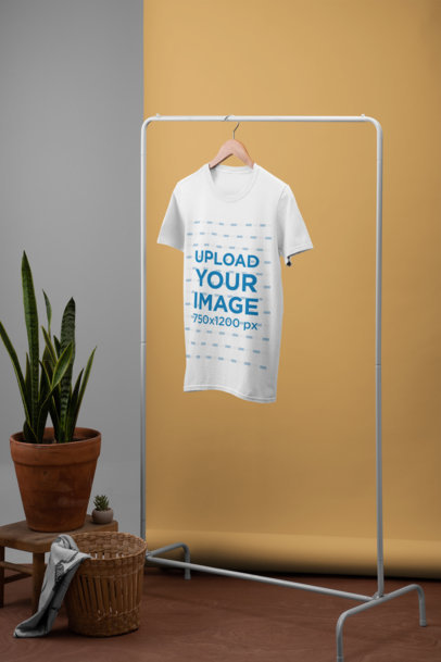 T-Shirt Mockup Featuring a Minimalistic Setting with Plants 27492