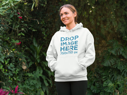 Woman at the Park Taking a Break from Running Hoodie Mockup