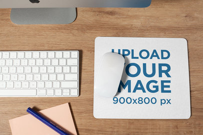 Mousepad Mockup on a Wooden Office Desk Next to a Keyboard