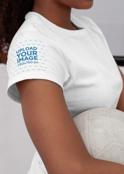 Tee Sleeve Mockup Featuring a Woman Holding a Volleyball