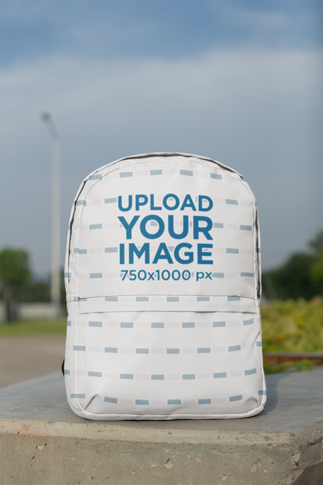 Backpack Mockup on a Concrete Column at an Open Natural Area