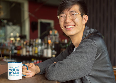 Mockup of a Smiling Man Drinking from an 11 oz Mug With Inner Rim Color