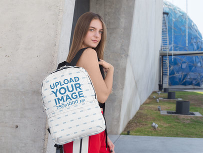 Mockup of a Teen Carrying a Backpack over Her Shoulder