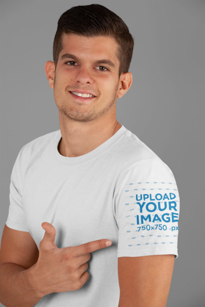 T-Shirt Sleeve Mockup of a Man in a Studio
