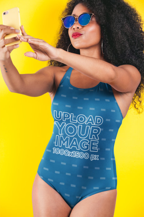 Swimsuit Mockup Featuring a Woman with Sunglasses Taking a Selfie