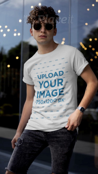 T-Shirt Video Featuring a Stylish Man Posing with His Sunglasses 