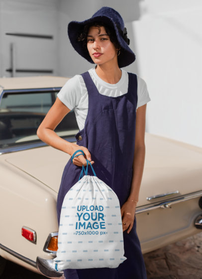 Drawstring Mockup of a Woman Standing Next to a Vintage Car 