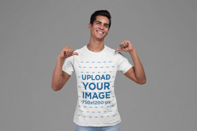 Mockup of a Tall Man Proudly Showing his T-Shirt at a Studio 27857