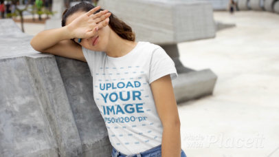T-Shirt Video Featuring a Woman Leaning on a Concrete Structure 22720