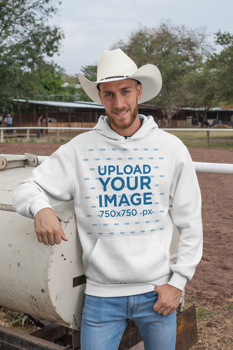 Pullover Hoodie Mockup Featuring a Cowboy at a Ranch