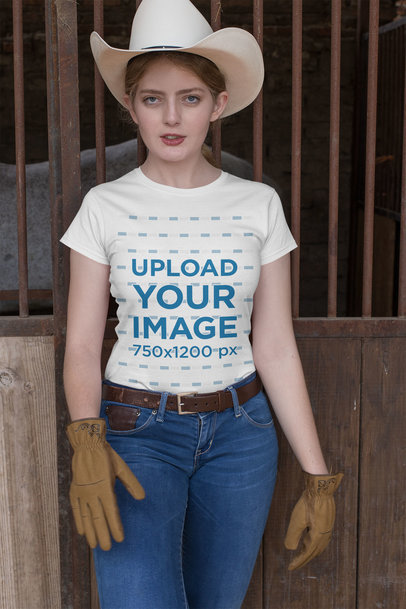 Mockup Featuring a Country Woman Wearing a T-Shirt in a Stable 