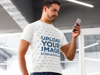 Man Using an iPhone at an Art Gallery T-Shirt Mockup