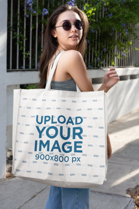 Grocery Bag Mockup Featuring a Woman on The Street