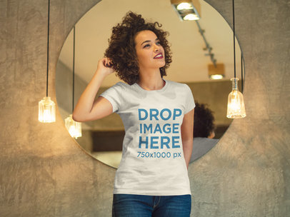 Woman Standing in Front of a Mirror T-Shirt Mockup