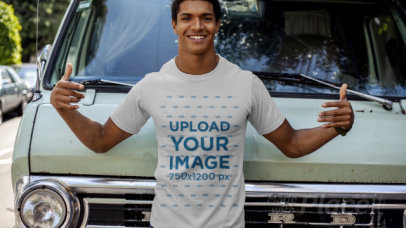 T-Shirt Video Featuring a Man Posing in Front of a Vintage Van 22628