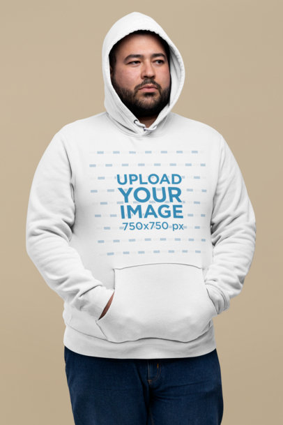 Mockup of a Bearded Man Wearing a Plus Size Pullover Hoodie at a Studio
