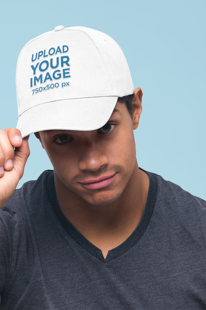 Dad Hat Mockup Featuring a Young Man Against a Plain Background 