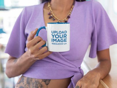 11 oz Two Toned Mug Mockup of a Tattooed Woman Leaning on a Bar 27841