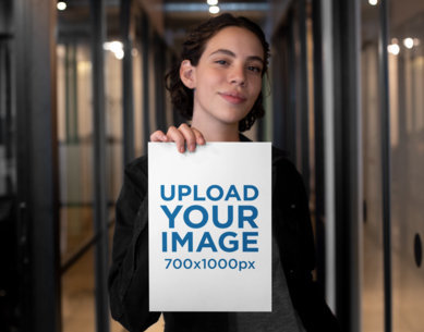 Mockup of a Woman Showing an A4 Flyer at a Corridor