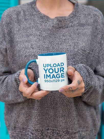 Mockup of a Woman with a Cozy Look Holding an 11 oz Color Rim Mug 27843