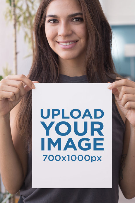 Mockup of a Smiling Woman Holding an A4 Flyer with Both Hands