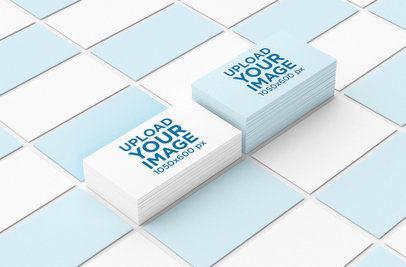 Mockup of Two Business Card Piles Lying Among a Mosaic of Business Cards