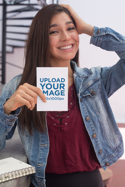 A6 Postcard Mockup of a Surprised Woman Holding Her Head
