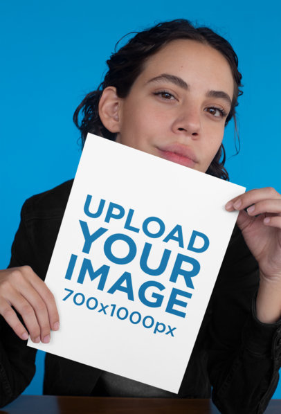 Mockup of a Woman Holding an A4 Flyer Near Her Face