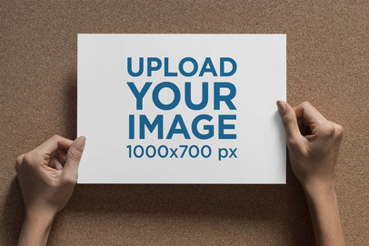  Mockup Featuring Woman's Hands Holding an A4 Flyer Against a Bulletin Board