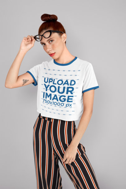Ringer T-Shirt Mockup of a Woman with Sunglasses at a Studio